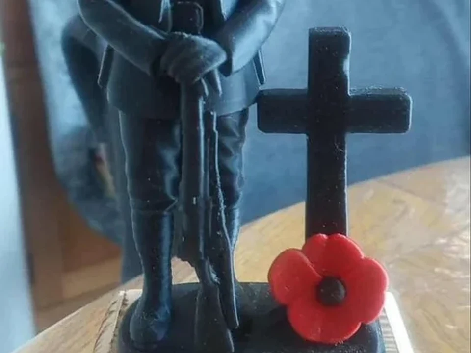 Detailed remembrance figure print with cross and poppy detail